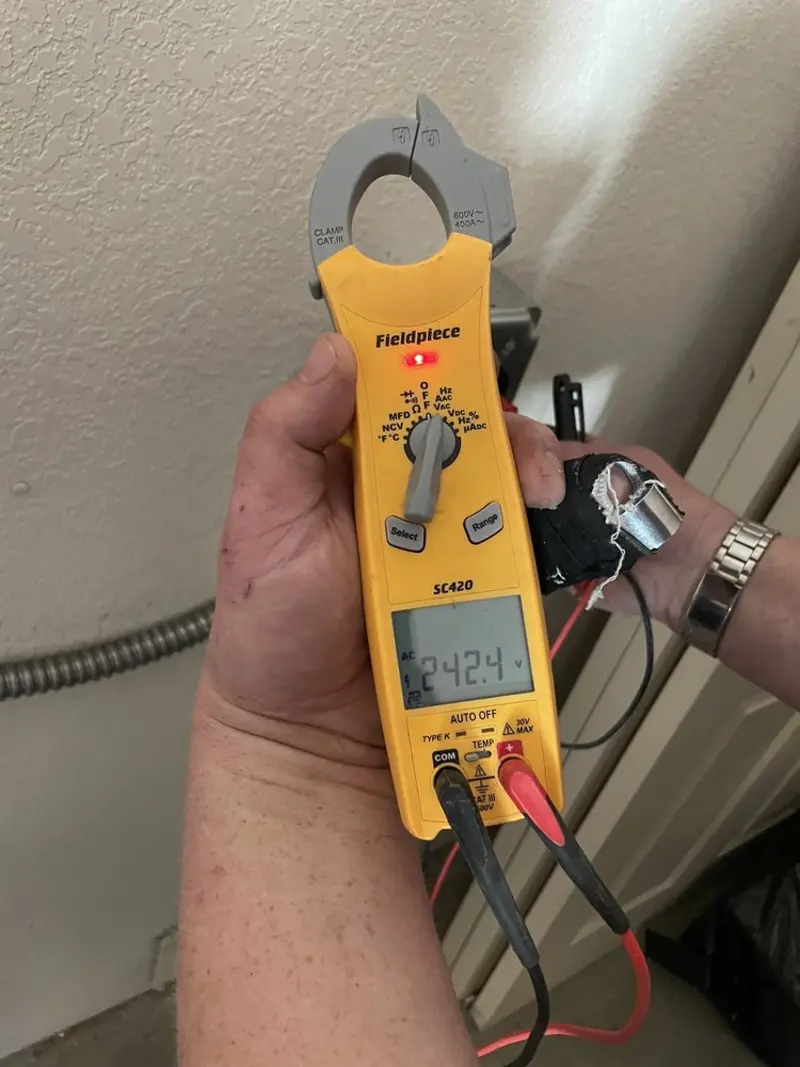 Voltage testing with clamp meter during Generator Installation in Southchase